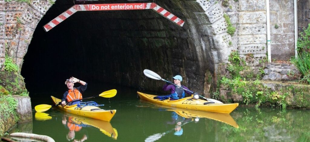 paddling through canal tunnels