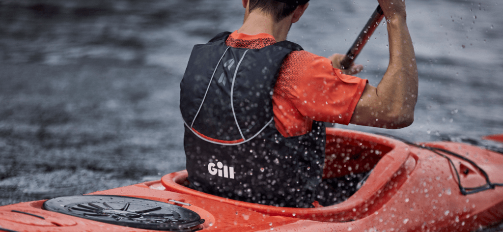 Kayaker wearing Gill Buoyancy aid