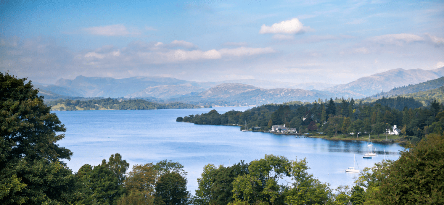 A view of Lake Windermere in summer the Lake District National Park in the UK. Planning a family kayaking holiday.Planning a family kayak holiday.