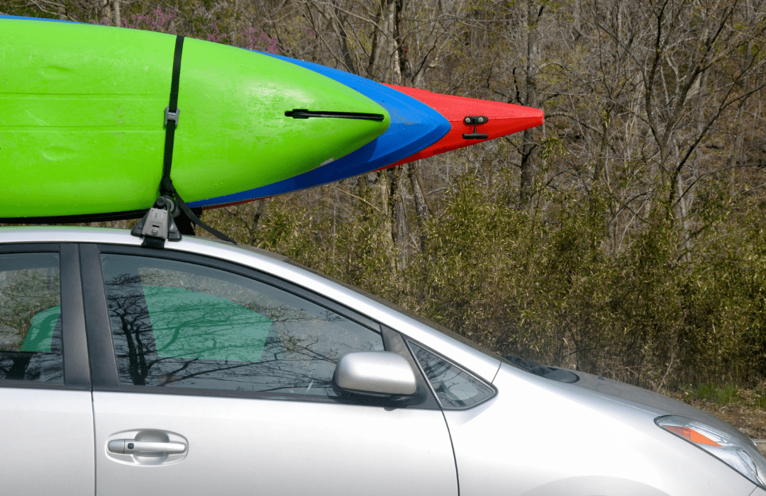 kayaks on roof of car