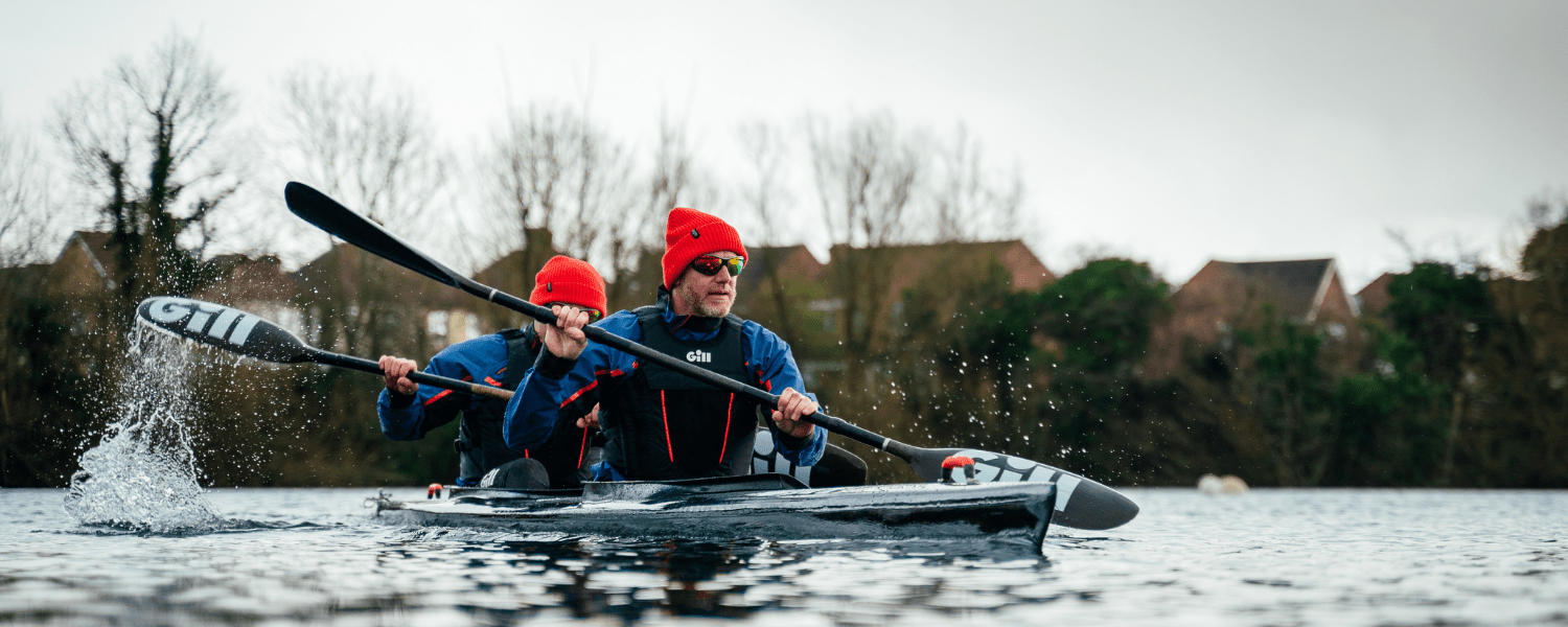 two people in a kayak with Gill kit on