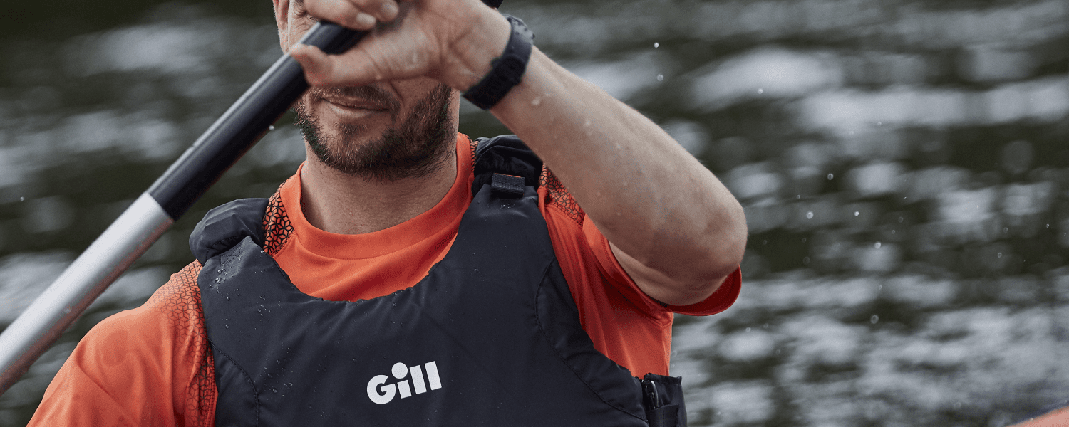 close up of a man kayaking 