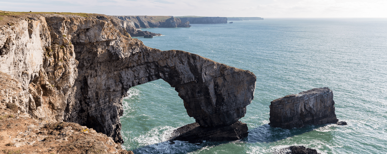 an arch in the sea cliffs on the pembrokeshire coast