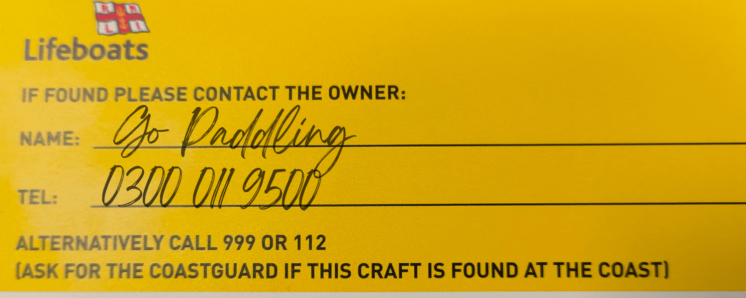 RNLI craft tag with go paddling and british canoeing phone number on