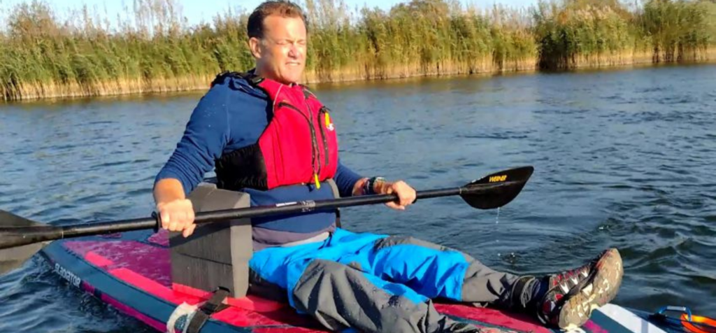 Will Behenna on his seated inclusive paddleboard