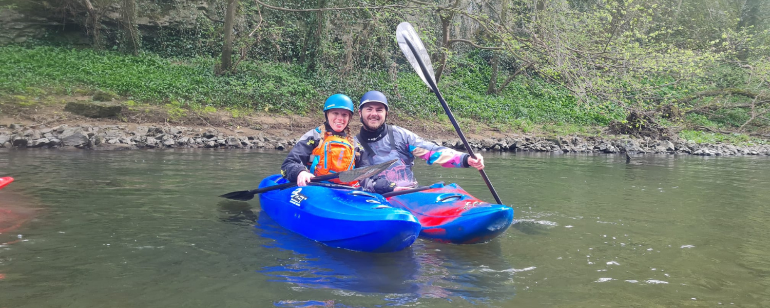 two people together in kayaks